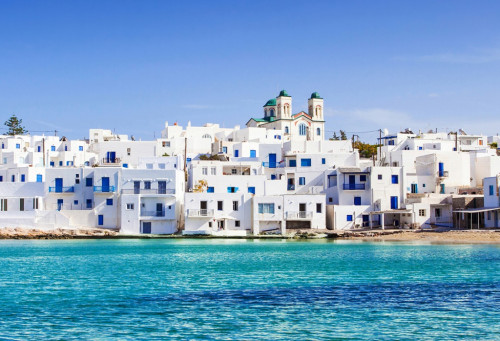 Greek village of Naousa Paros island GreeceiStock 499488620 banner